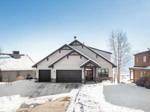 View of front of property with a garage