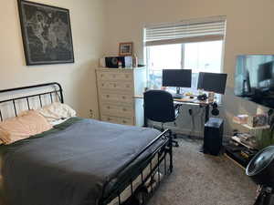 Bedroom 1 featuring carpet floors