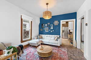 Living room with an inviting chandelier