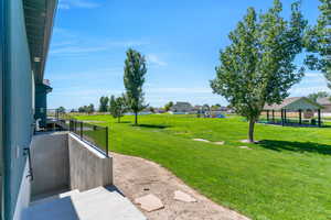 View of yard featuring a playground and a gazebo