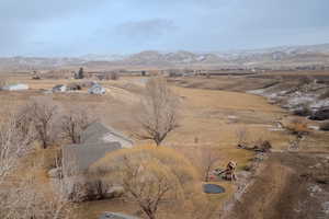 Property view of mountains with a rural view