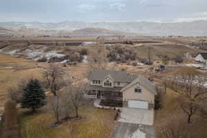 Drone / aerial view with a rural view and a mountain view