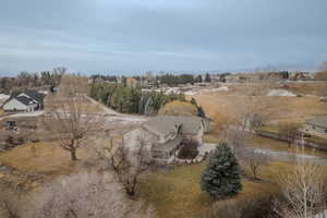 Birds eye view of property featuring a rural view