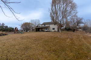 View of yard with a playground