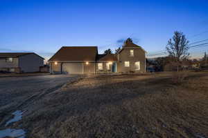 View of front of property featuring a garage