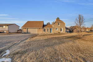 View of front of property with a garage