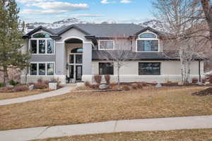 View of front of house featuring a front lawn