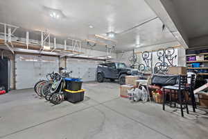 Garage featuring a garage door opener