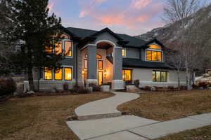 View of front facade featuring a lawn