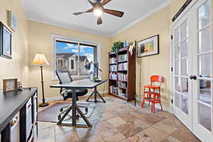 Office featuring french doors, ceiling fan, and crown molding