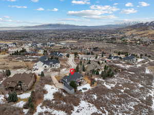 Snowy aerial view with a mountain view