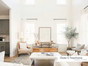 Living room with light wood-type flooring