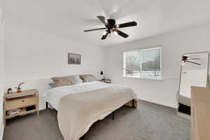 Bedroom with carpet floors and ceiling fan