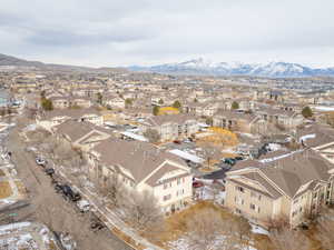 Birds eye view of property with a mountain view