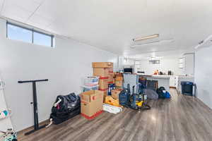 Basement with hardwood / wood-style floors