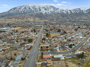 Birds eye view of property with a mountain view