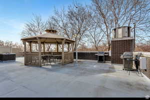 View of patio / terrace with a gazebo and grilling area