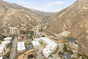 Birds eye view of property with a mountain view