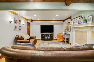 Living room featuring ornamental molding