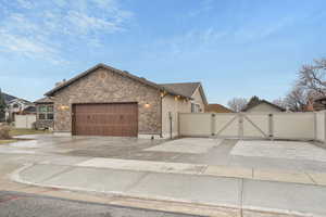 View of front facade featuring a garage