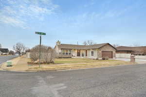 Ranch-style house featuring a garage