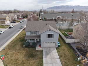 Exterior space featuring a residential view and a mountain view