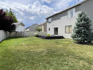 View of yard featuring a wooden deck