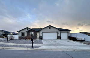 Single story home featuring a garage