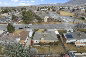 Birds eye view of property with a mountain view