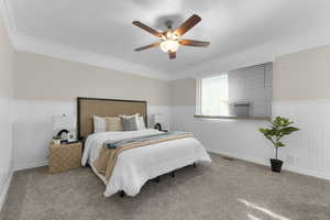 Bedroom with ceiling fan and carpet flooring