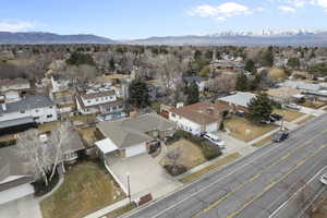 Birds eye view of property with a mountain view