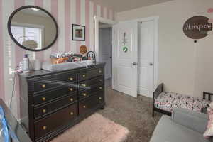 View of carpeted bedroom