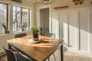 Dining room featuring light tile patterned flooring