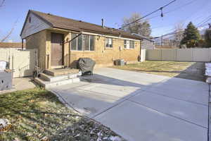 Back of property with a patio area