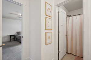 Bathroom featuring a shower with shower curtain