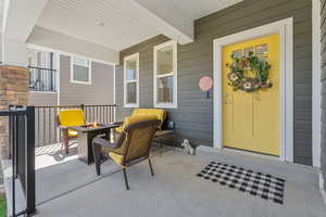 View of patio / terrace with covered porch and an outdoor fire pit