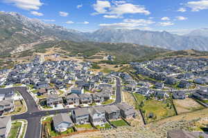 Birds eye view of property with a mountain view