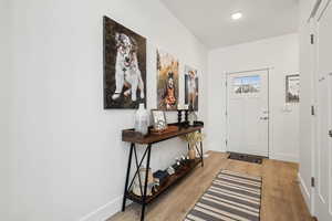 Entryway with light wood-type flooring