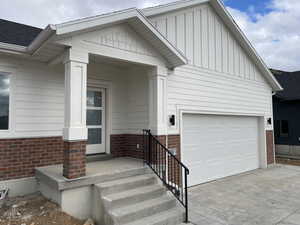 View of front of property with a garage