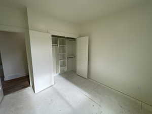 Unfurnished bedroom with a closet