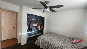 Upstairs Bedroom #1 featuring ceiling fan, dark hardwood / wood-style floors, and a closet