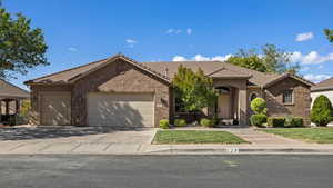 View of front of home featuring a garage