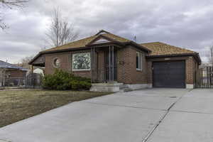 View of front of house with a garage