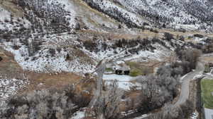 Snowy aerial view with a mountain view