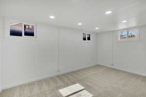 Basement with carpet flooring