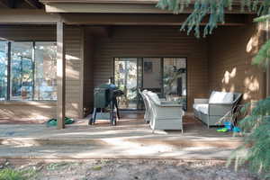 View of patio / terrace featuring an outdoor hangout area, grilling area, and a deck