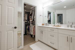 Bathroom with vanity and tile patterned floors