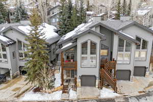 View of front of property with a garage