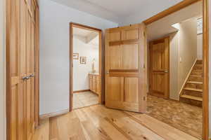 Corridor featuring light hardwood / wood-style flooring