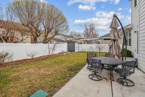 View of yard with a patio area